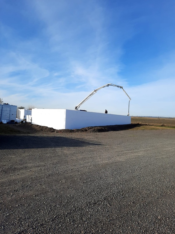 Commercial building walls braced with continuous waler lines
